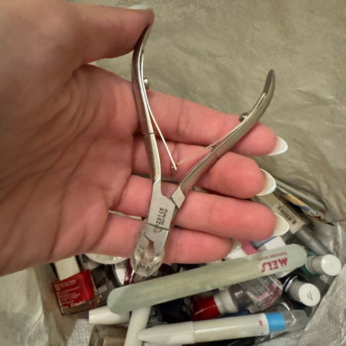 Various nail polishes and nail tools like new