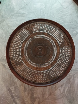 Vintage round coffee table with wicker and protective glass used