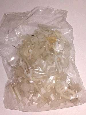 Curtain clips used, white