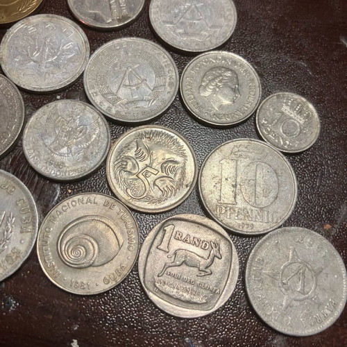 Lot of 44 foreign coins used from Cuba Venezuela Argentina China and more