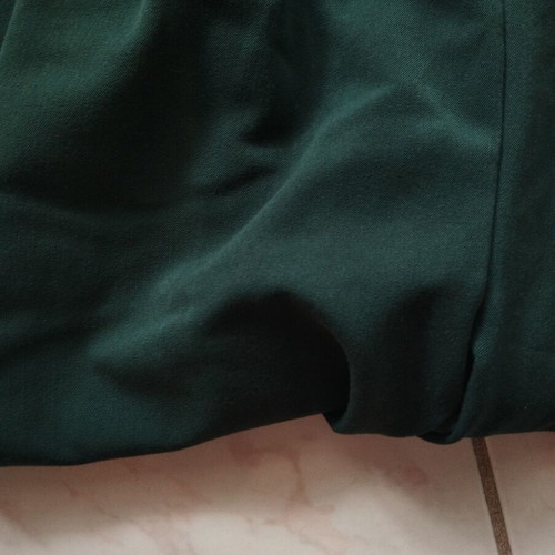 Strapless jumpsuit dark green with smocking and elastic legs, used, size S