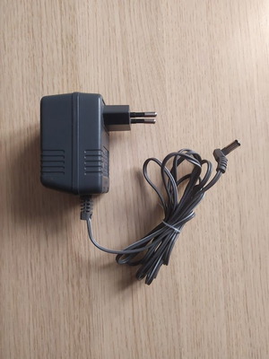 Panasonic AC адаптер 6V модел POLV19CE като нов