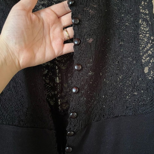 Knitted black salopette with buttons, size S, like new