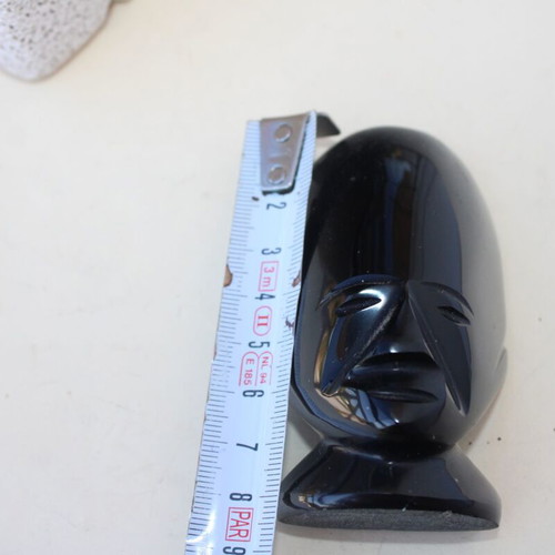 Obsidian African face sculpture