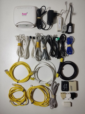Modem-router και διάφορα δικτυακά καλώδια, ethernet, splitters, filters σαν καινούργιο