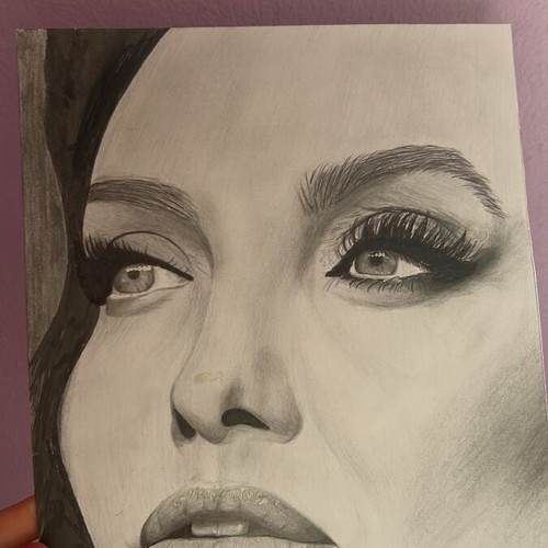 Angelina Jolie drawing on cardboard new