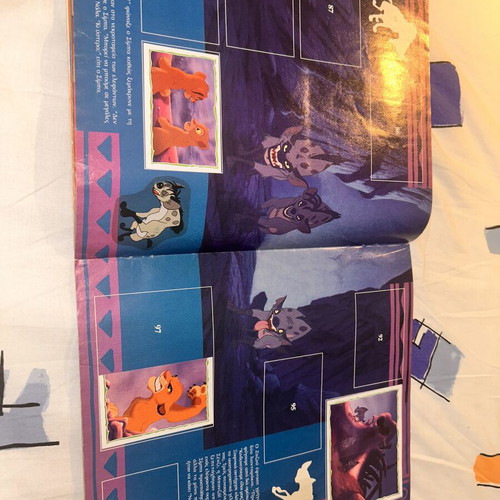 The Lion King Panini album used with 62 stickers