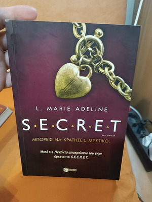 Secret by L. Marie Adeline novel like new, Greek