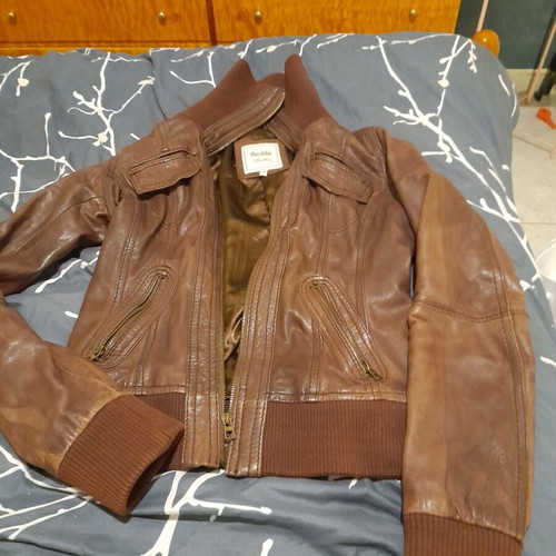 Brown leather women's jacket used with broken zipper