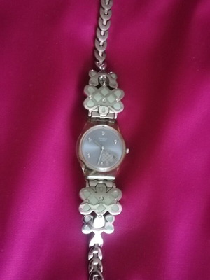 Swatch women's wristwatch 2006 stainless steel like new, turquoise and silver