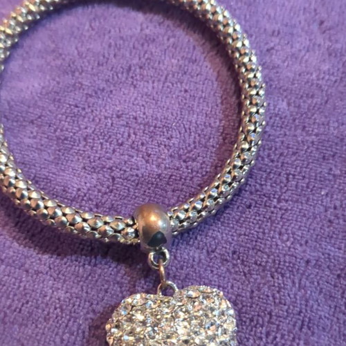 Elastic bracelet used with decorative silver heart charm