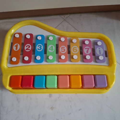 Xylophone with piano used children's toy