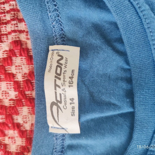 Action Sportswear sleeveless t shirt size 14 like new, blue