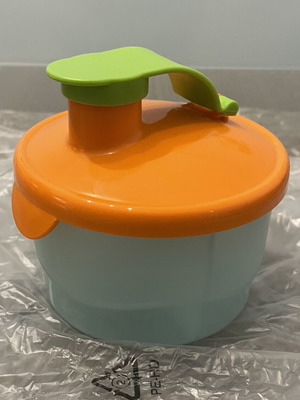 Tupperware baby food container with three compartments