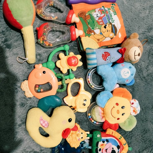 Fisher Price colorful activity gym for newborns used with extra toys