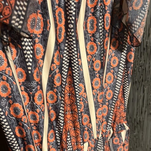 Women's jumpsuit like new, size L, colorful with ruffles