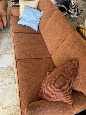 Three-piece living room set with sofa and two armchairs