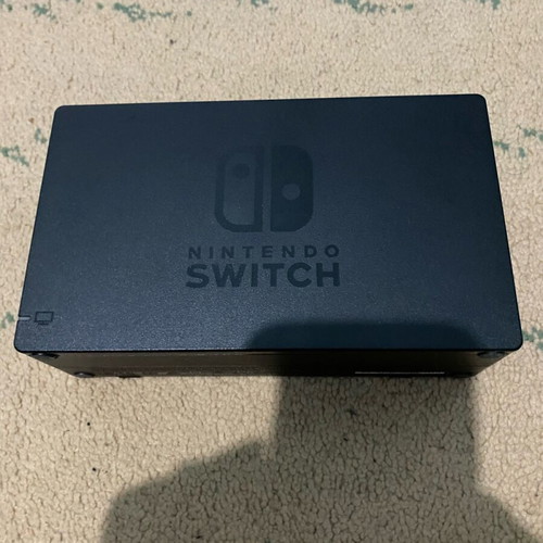 Nintendo Switch dock and controller for Joy Con, red Joy Con like new