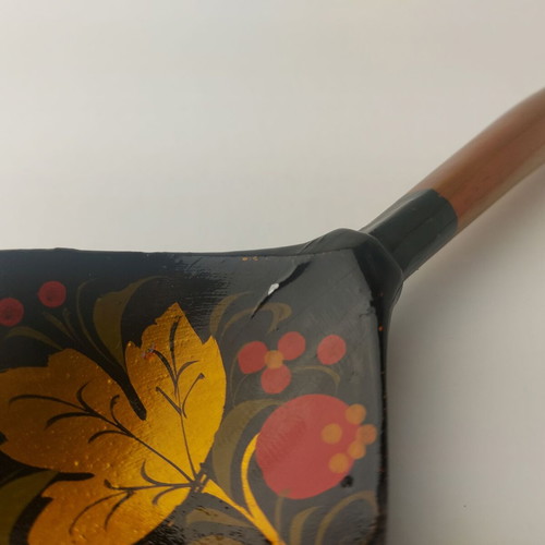 Old painted wooden spoon used