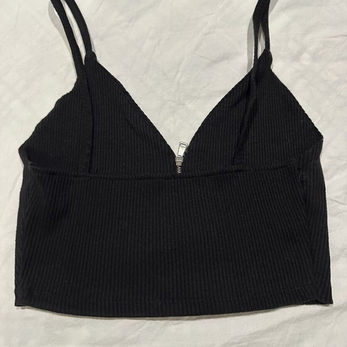 Black ribbed crop top with straps and front zipper