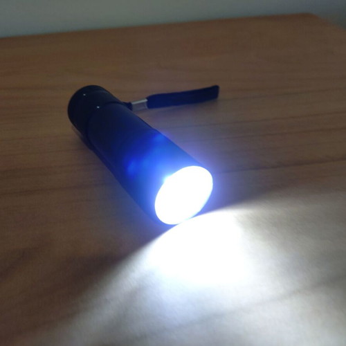 Small flashlight like new, takes 3 AAA batteries