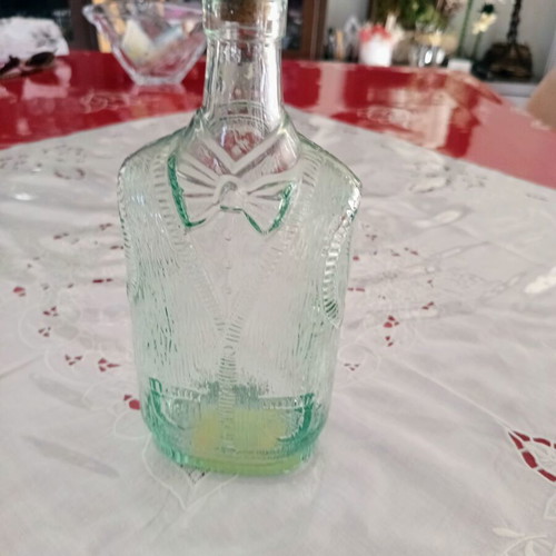 Vintage glass bottle Bormioli Rocco with vest and bow tie design, like new