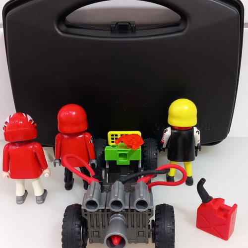 Playmobil car with pull back motion and 3 figures used