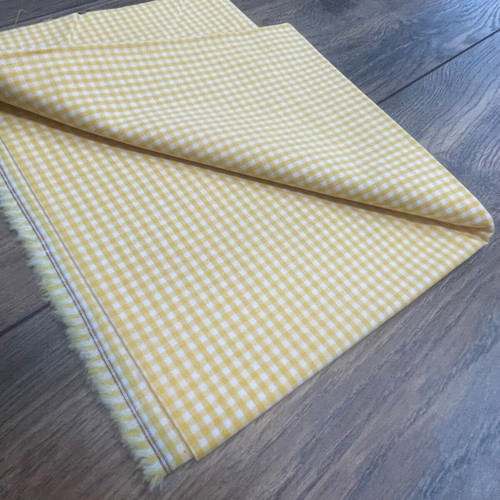 Checked fabric 0.50 x 1.50 like new, yellow