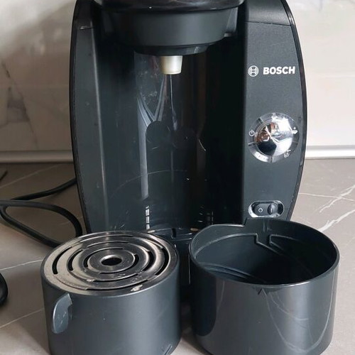 Bosch Tassimo coffee maker used with instructions and cleaning system