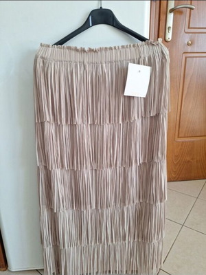 Skirt new, beige, one size with fringes