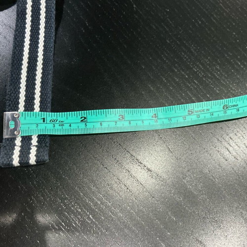Striped belt like new, adjustable, white and blue