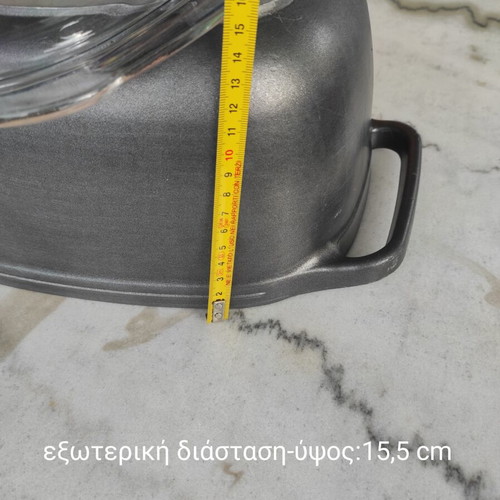 Glass Pyrex and cast iron pot used with surface wear
