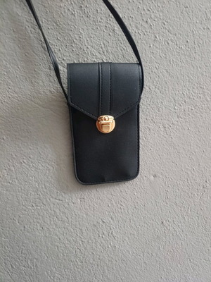 Crossbody bag with gold clasp like new, black