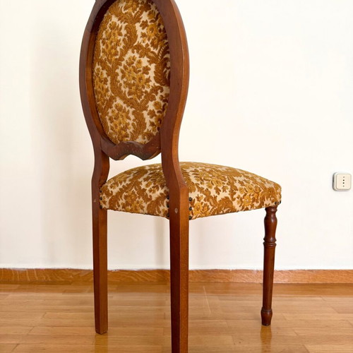 Chair used with wooden frame and brown velour fabric with floral pattern