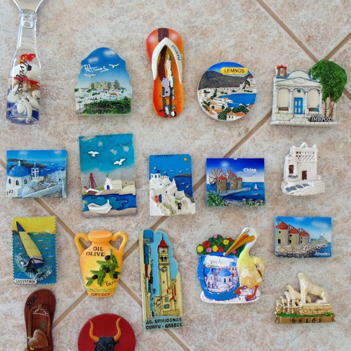 Collection of 18 used embossed fridge magnets from Greek tourist islands