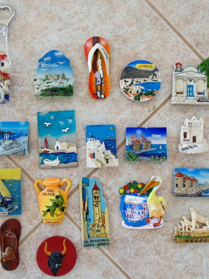 Collection of 18 used embossed fridge magnets from Greek tourist islands