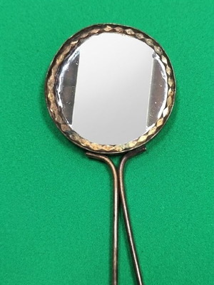 Pocket mirror with loop handle used, retro vintage style