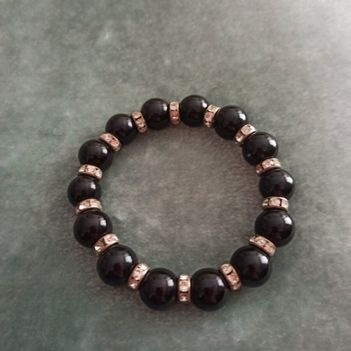 Bracelet with black beads and white crystals like new
