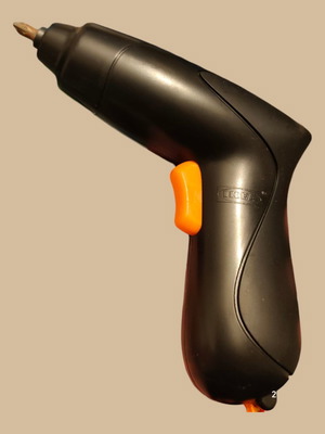 Rechargeable electric screwdriver used with charger and bit