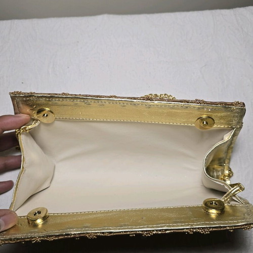 Gold Clutch with Chain like new, elegant embroidered glitter design