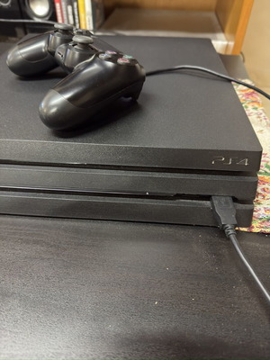 Sony PlayStation 4 Pro 1TB like new with controller and games