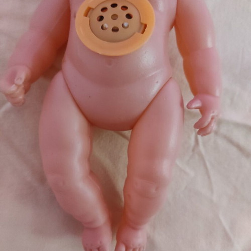 Plastic laughing doll 25cm like new