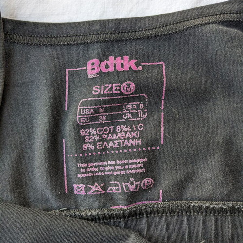 Bdtk two used sports bras size Medium, black and gray