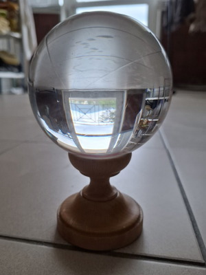 Crystal sphere with wooden base like new, 11cm diameter