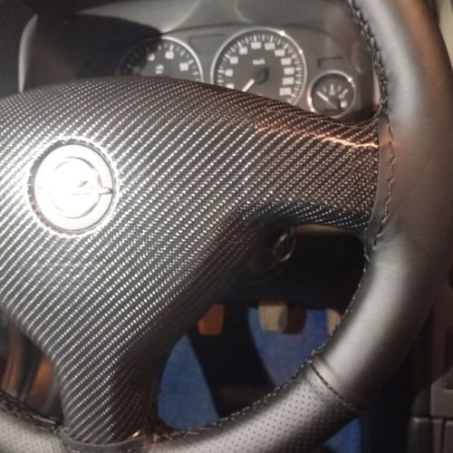 Hand-stitched steering wheel cover with installation