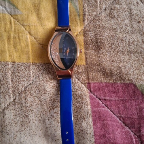 Wristwatch new with modern design in blue color
