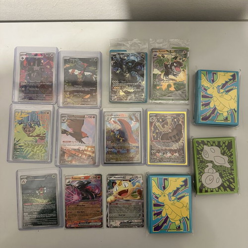 Pokemon lot like new with 3 packs sleeves