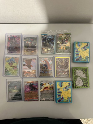 Pokemon lot like new with 3 packs sleeves
