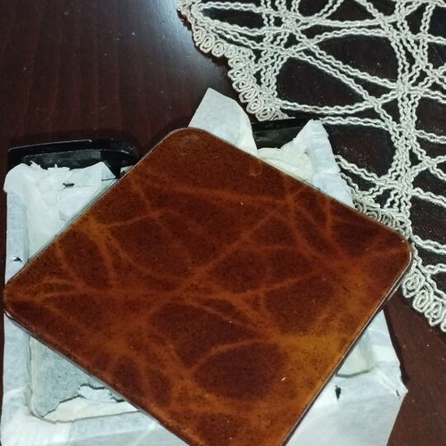 Vintage coaster set with tortoiseshell effect and case