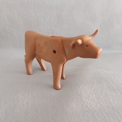 Playmobil cow used with small horn damage